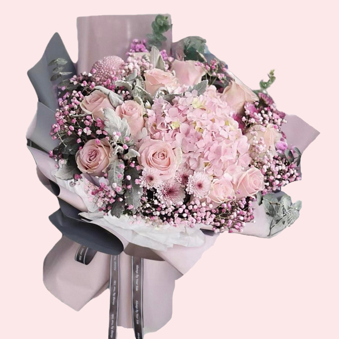Bouquet of pink roses, pink hydrangeas, chrysanthemums and baby's breath