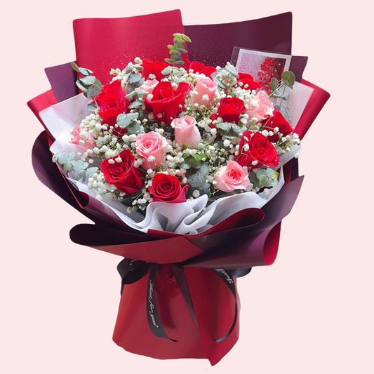 11 red roses, 8 pink roses, with white baby's breath bouquet