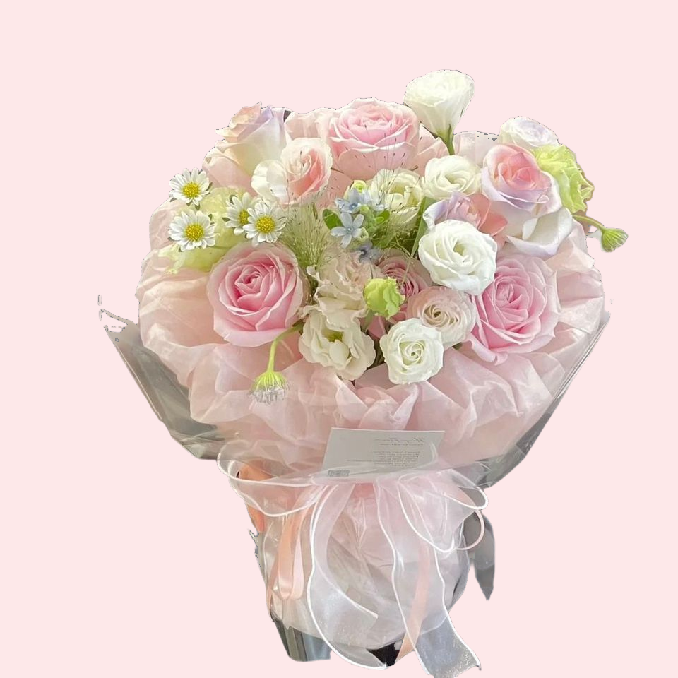 Bouquet of pink roses, lisianthus and chamomile