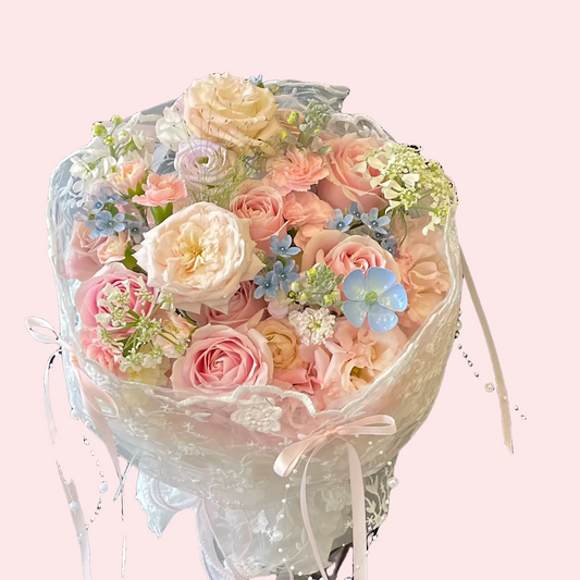 6 pink snow mountain roses with blue star flowers