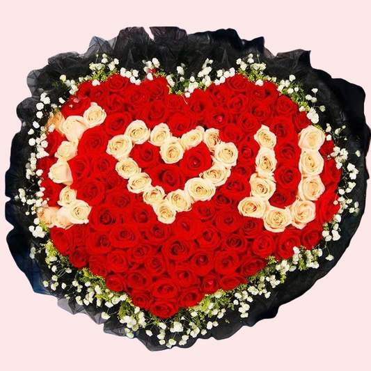 99 red and champagne roses in a heart-shaped bouquet with the letter I❤️U