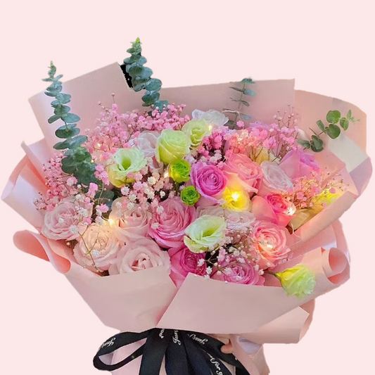 Two shades of pink roses, mixed with platycodon and baby's breath bouquet