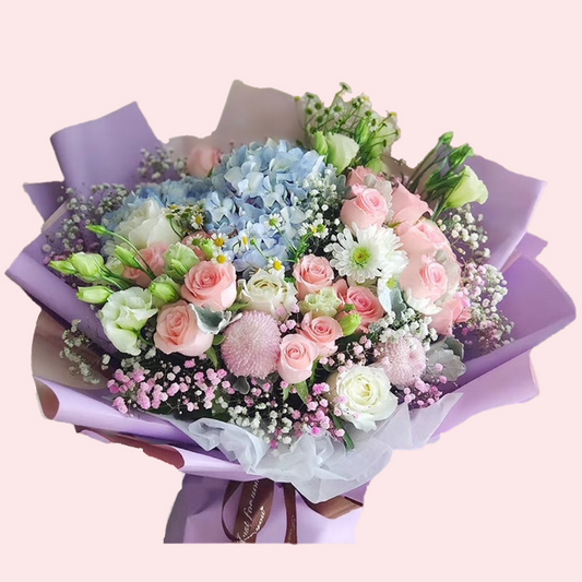 Bouquet of pink roses, hydrangea, chrysanthemum, platycodon, baby's breath, and chamomile