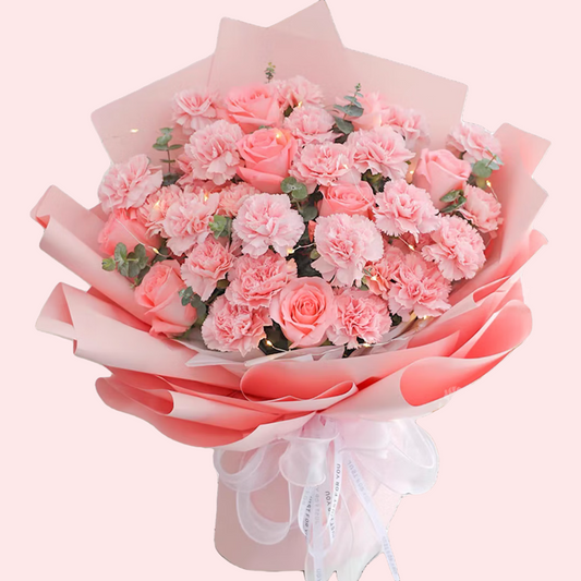 Pink carnations, mixed with pink roses bouquet